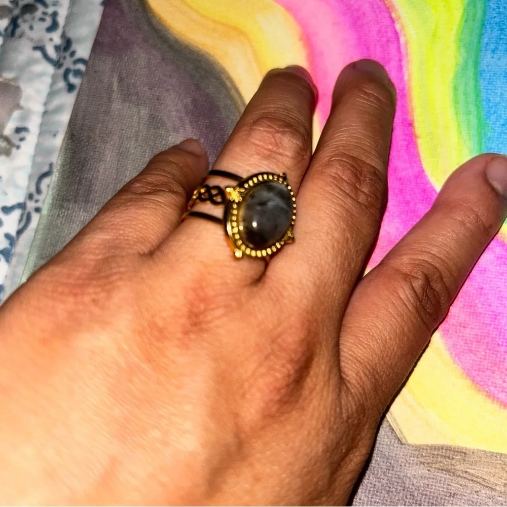 Elegant Gold and Black Ring